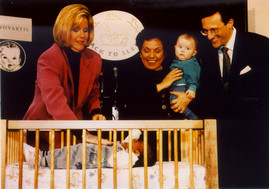 Tipper Gore with Secretary of Health and Human Services Donna E. Shalala, Ph.D., and Daniel Vasella, M.D., head of Novartis, parent company of Gerber Baby Products, another Back to Sleep partner